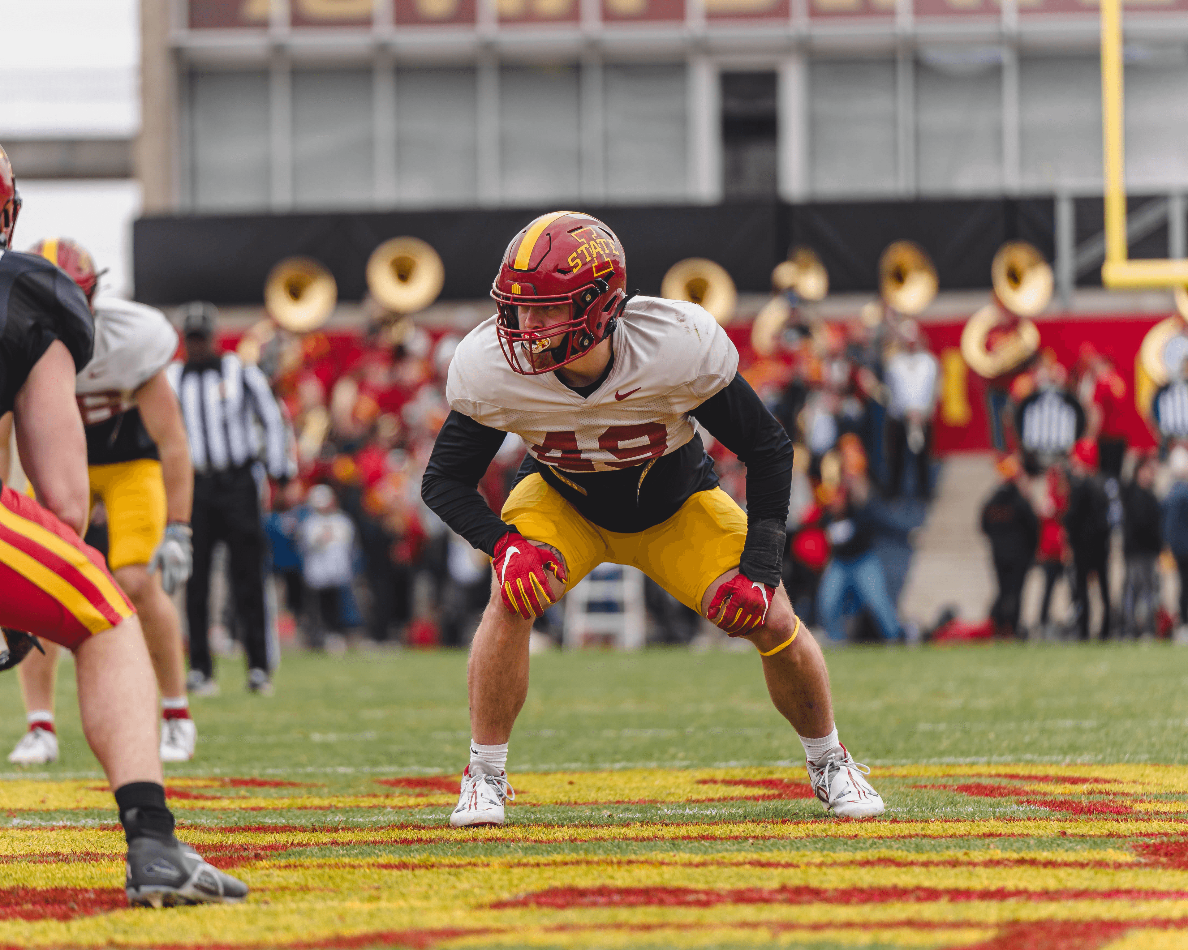 Kade Gilbertson playing football at Iowa State